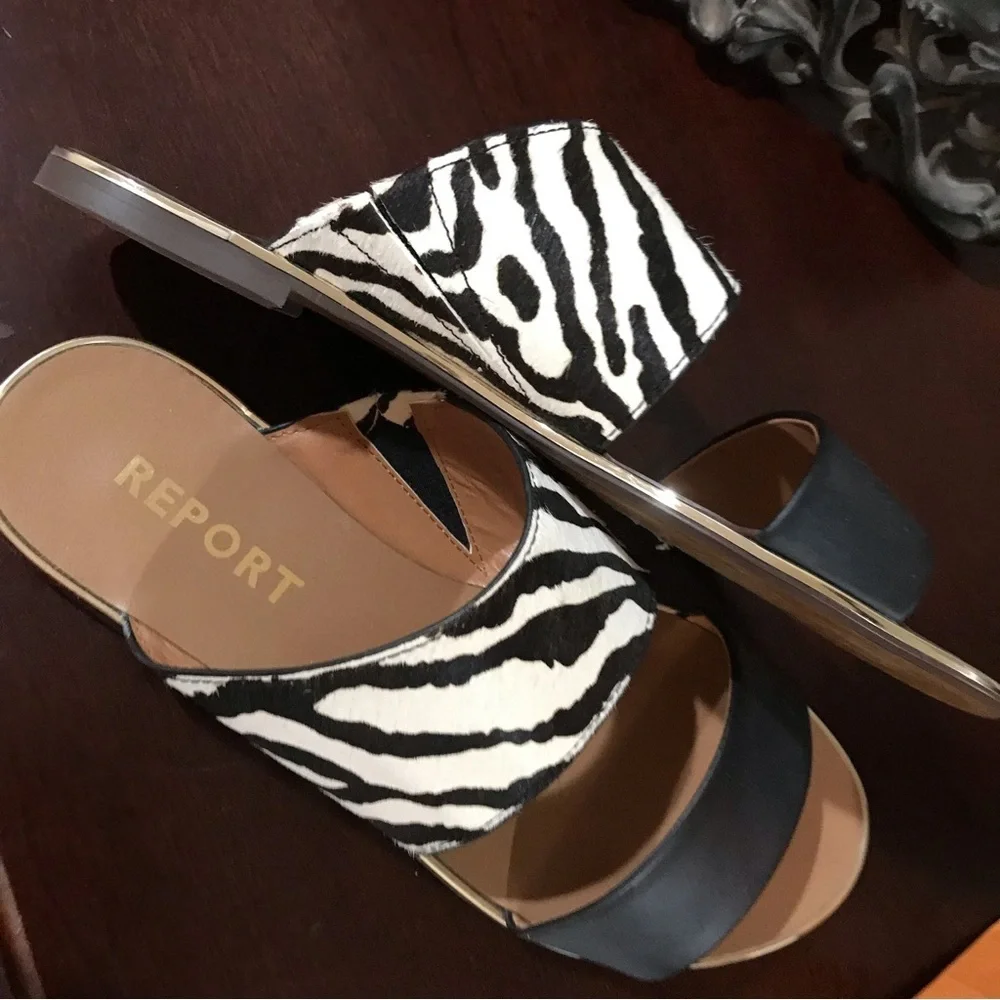 🦓REPORT Black Exotic Slip On Sandals